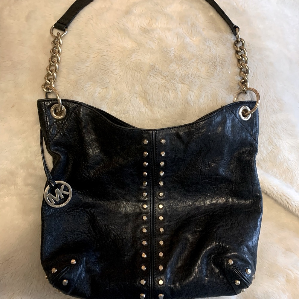 Authentic Michael Kors vintage genuine black leather bag with silver accents